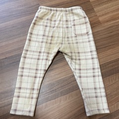 ベージュ系チェック柄パンツの画像
