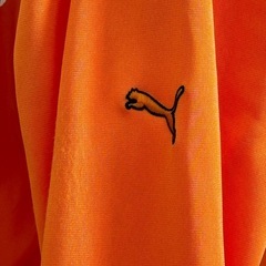 PUMAゴルフウエア　オレンジジャージの画像