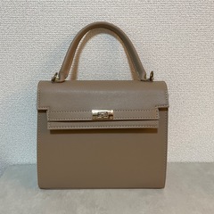  DHOLIC ゴールドバックルフラップバッグ の画像