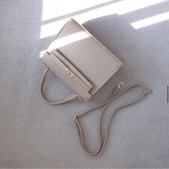  DHOLIC ゴールドバックルフラップバッグ の画像
