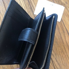 coach二つ折り財布の画像
