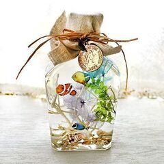★海モチーフのハーバリウム　コインとオリジナル熱帯魚の画像