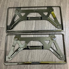 日産純正ナンバーフレーム未使用
の画像