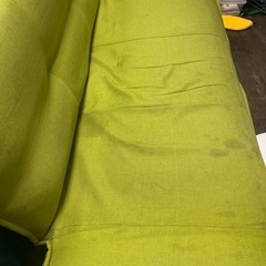  緑のソファーベッドの画像