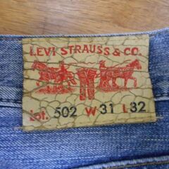 Levi’s 502 W31 革(白)パッチ リーバイス　USEDの画像