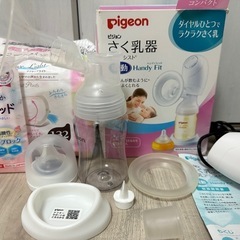 電動搾乳器と母乳パットのセットの画像
