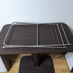 折りたたみ式のタオル掛けの画像