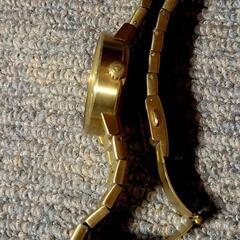 NIXON ゴールド アナログ腕時計の画像