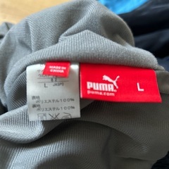美品Ｌサイズ表記　小さめPUMA 紺色ズボンの画像