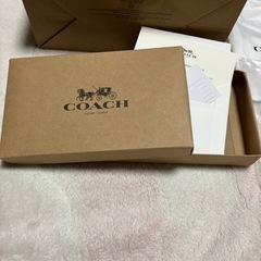 COACH ショップ袋と付属品セットの画像