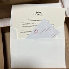 COACH ショップ袋と付属品セットの画像