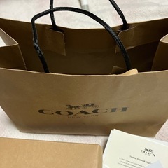 COACH ショップ袋と付属品セットの画像