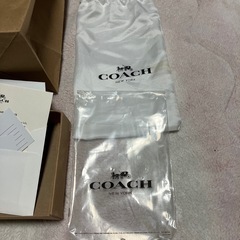 COACH ショップ袋と付属品セットの画像