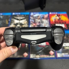 PS4本体+ソフト8種+収納スタンドの画像