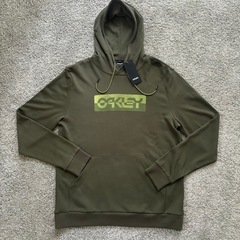 新品タグ付 OAKLEY オークリー パーカー 今季商品Duality B1B Po Hoodie の画像