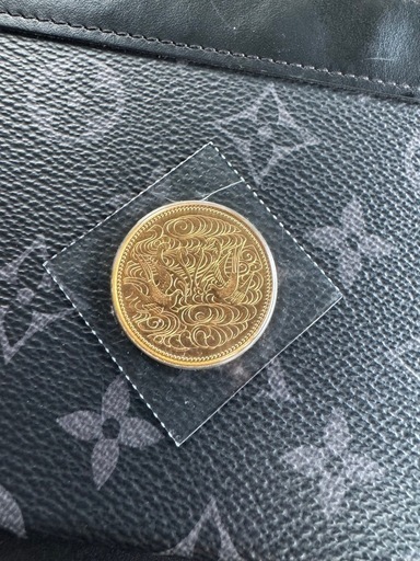 天皇陛下御在位60年記念10万金貨