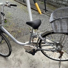 電動機付き自転車。  