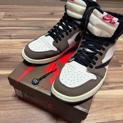 Travis Scott × Nike Air Jordan 1...