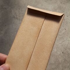 【ハンドメイド】飴色に育つヌメ革のヘソクリ袋(革封筒)の画像