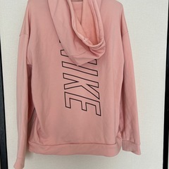 NIKE 薄ピンクパーカー
の画像