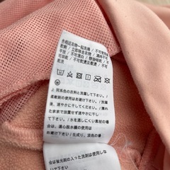 NIKE 薄ピンクパーカー
の画像