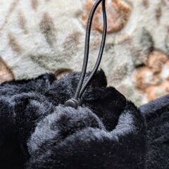 300円　未使用　黒リバーシブルレッグウォーマー　格納袋つきの画像