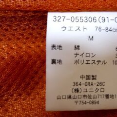 ユニクロ　メンズパンツ　サイズM　オレンジ　ウエスト76～84㎝　股下72㎝（実測）綿65、ナイロン35、裏総メッシュポリエステル100％　右後ろに色落ちあり　ホームクリーニング済　USEDの画像