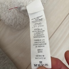 patagonia 耳付きニット帽 6-12M ホワイトの画像