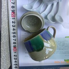 未使用の蓋つきのコーヒーカップの画像