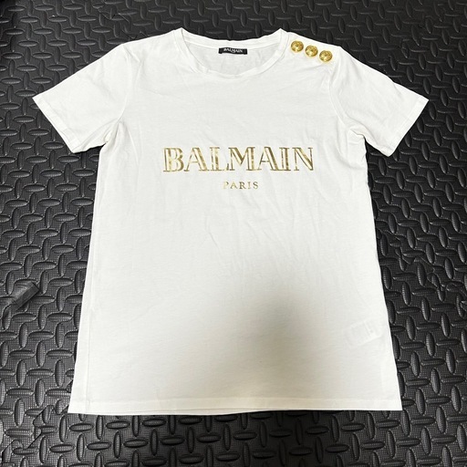 注目商品|BALMAIN バルマンホワイト Tシャツ ゴールドロゴ金具