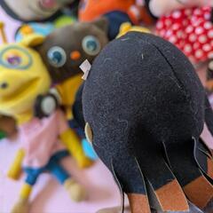 ぬいぐるみと無料チケットの画像