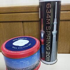 お菓子などお土産の空き缶の画像