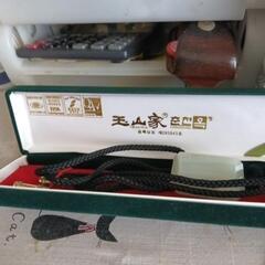 ③翡翠ループタイ?の画像