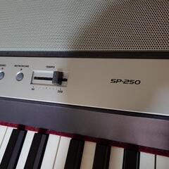 【受け渡し予定者決定】電子ピアノ　KORG SP-250　ペダル、台付きの画像