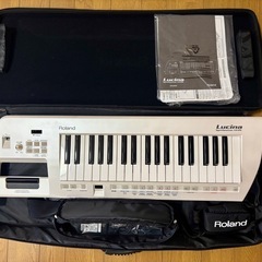 Roland AX-09 ショルダーキーボード/シンセサイザー ...