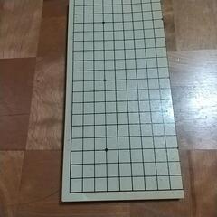 囲碁と囲碁盤の画像