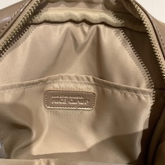 NICE CLAUP ベージュの画像