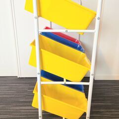 3段 おもちゃラック  赤青黄の画像