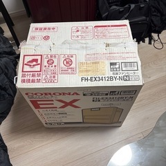 コロナ_ガスファンヒーターとポリタンクの画像