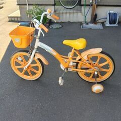 小学校低学年※補助輪付き自転車※オレンジカラーの画像