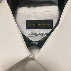 CHRISTIAN ORANIの白のワイシャツの画像