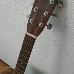 アコースティックギター（ピック・ギタースタンド付）の画像