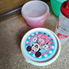 中古タッパー　タッパーウエア　緑の円形のもの外径約19.5cmの画像