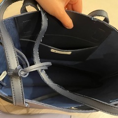 明日処分。トートバッグの画像