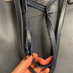 明日処分。トートバッグの画像