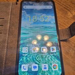 スマホ本体（手帳型ケース付き）の画像
