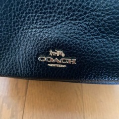 coach ミニリュックの画像