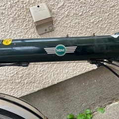 お話し中　折りたたみ自転車の画像