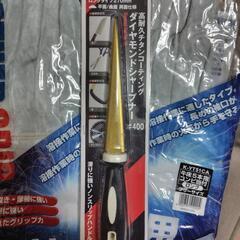 溶接用革手とシャープナーの画像