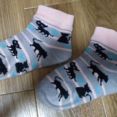 足首部分が伸びた厚め靴下　猫シルエット　古着　の画像